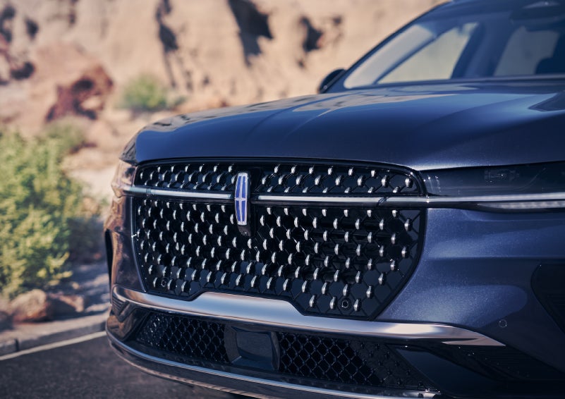 The stylish grille of a 2024 Lincoln Nautilus® SUV sparkles in the sunlight. | Pines Lincoln in Pembroke Pines FL