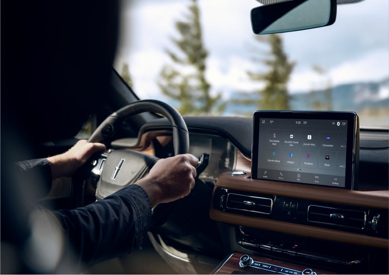 The Lincoln+Alexa app screen is displayed in the center screen of a 2023 Lincoln Aviator® Grand Touring SUV | Pines Lincoln in Pembroke Pines FL